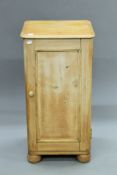 A Victorian pine pot cupboard. 37.5 cm wide.