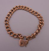 A 9 ct gold hollow curb bracelet. 21 cm long. 16.4 grammes.