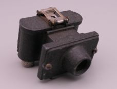 A Merlin Sub miniature camera. 3.5 cm high.