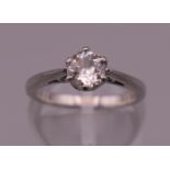 A platinum 1/2 carat diamond solitaire ring. Ring size J. 4.1 grammes total weight.