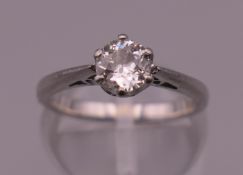 A platinum 1/2 carat diamond solitaire ring. Ring size J. 4.1 grammes total weight.