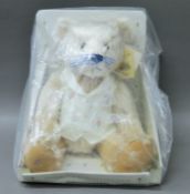 A boxed Harrod's teddy bear.