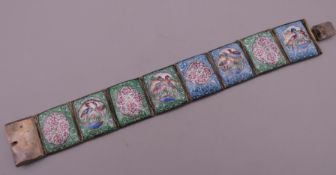 An enamel bracelet. 16.5 cm long.