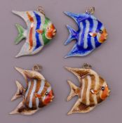 Four silver and enamel fish pendants. Each approximately 3 cm high.