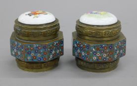 A pair of 19th century Chinese octagonal jars and covers with blue ground,