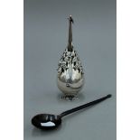 An Ottoman white metal rose water sprinkler and a 19th century horn sherbert spoon.