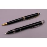 Two Mont Blanc pens.