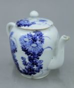 A 19th century Japanese porcelain teapot. 9.5 cm high.
