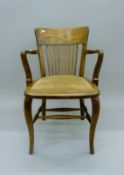 An early 20th century oak desk chair. 56 cm wide.