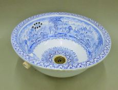 A Victorian blue and white porcelain sink. 44 cm diameter.