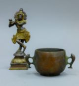 A small bronze censer and an Indian deity. The latter 14 cm high.