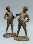 A pair of patinated spelter figures. 40 cm high.