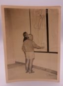 A signed Picasso photograph. 8.5 x 12 cm.