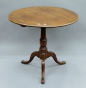 A 19th century mahogany tilt top tripod table. 79 cm diameter.
