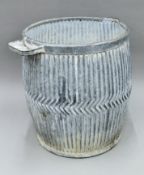 An early 20th century galvanized wash bucket. 51 cm high.