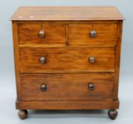 A Victorian walnut chest of drawers. 91 cm wide.