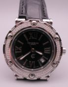 A Charriol gentlemen's wristwatch with diamond set bezel. 4 cm wide.