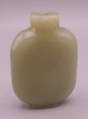 A jade snuff bottle. 7 cm high.