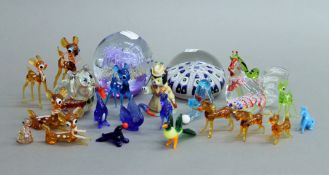 A quantity of various glass animals and paperweights.