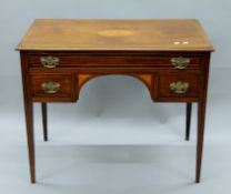A Victorian inlaid side table. 91 cm wide.