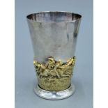 A Victorian Pryor Tyzack and Co silver plated and gilt beaker decorated with a horse racing scene.