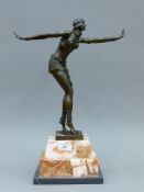 An Art Deco style bronze figure of a girl. 49 cm high.
