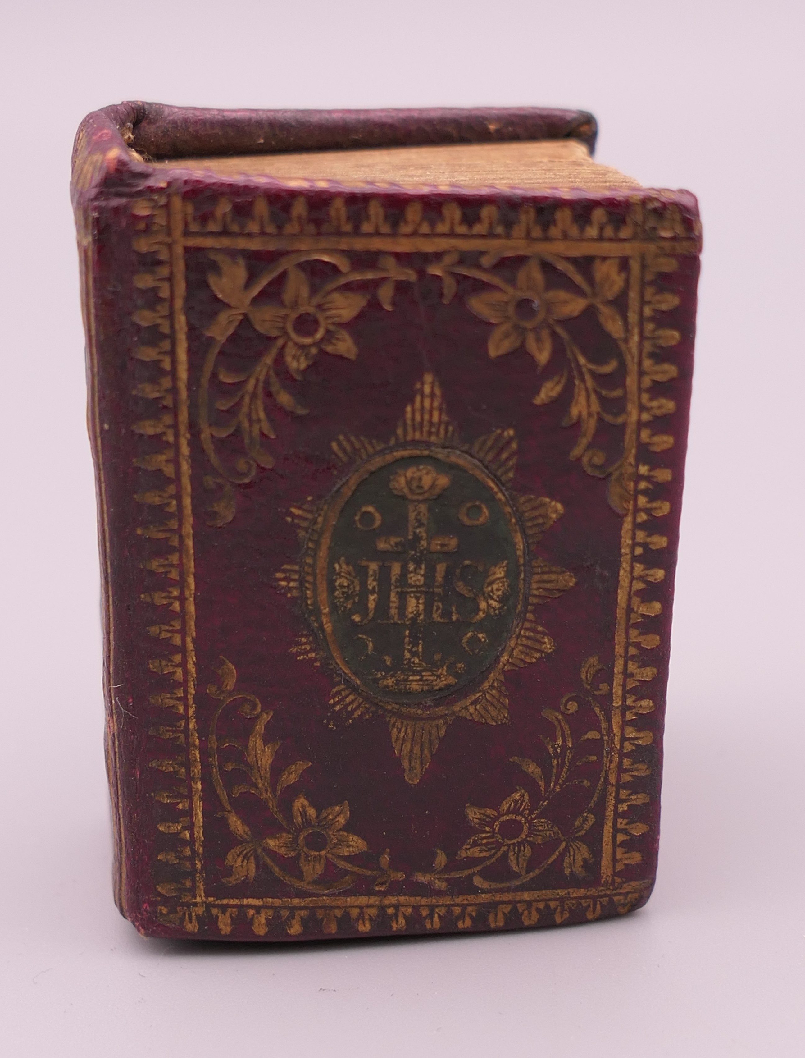 A 1786 miniature Bible. 3 cm wide.