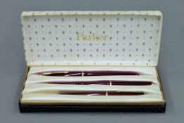 A Parker pen set.