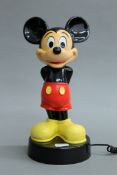 A Mickey Mouse novelty telephone.