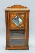 A Victorian inlaid rosewood music cabinet. 53.5 cm wide.