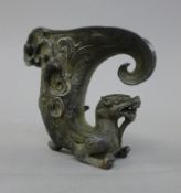 A bronze dog-of-fo libation cup. 9.5 cm high.