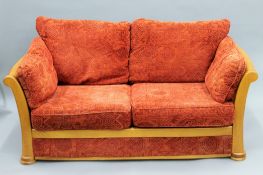 A modern sofa. Approximately 163 cm wide.