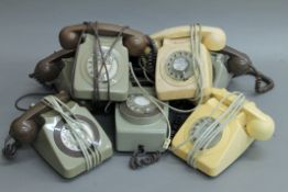 A quantity of vintage telephones.