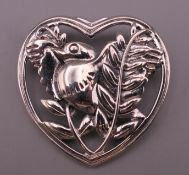 A Denmark silver heart and bird form brooch. 3.