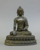 A bronze seated model of Buddha. 20.5 cm high.