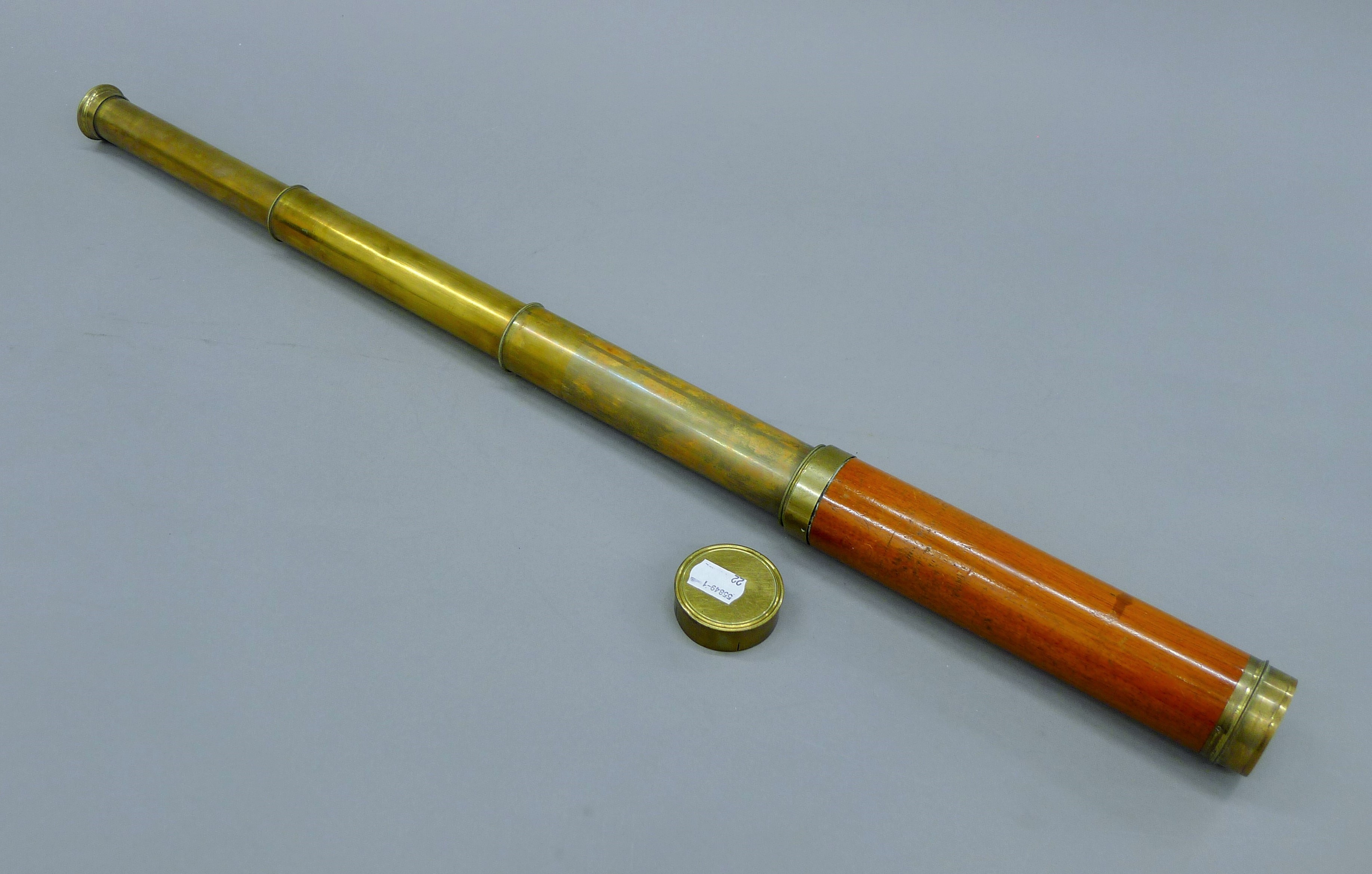 A brass and mahogany three drawer telescope. 74 cm long extended. - Image 3 of 3