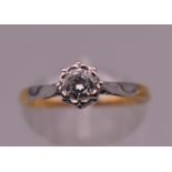 An 18 ct gold diamond solitaire ring. Ring size L. 2 grammes total weight.