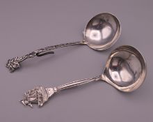 Two Dutch silver caddy spoons. The largest 12 cm long. 40 grammes.