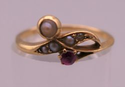 A Victorian 18 ct gold crossover ring. Ring size M/N. 2.7 grammes total weight.