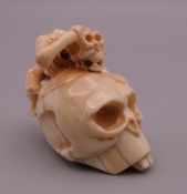A bone carving formed as a skull. 5.5 cm high.