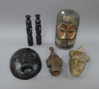 A collection of various African carvings. The largest 33 cm high.