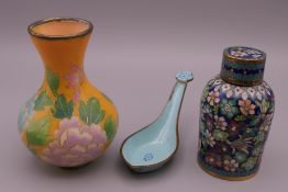 A Chinese plique a jour vase, a cloisonne jar and cover and a Canton enamel spoon.