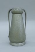 An Arts and Crafts pewter two handled vase. 22.5 cm high.