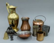 A box of various metalware.