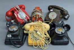 A quantity of vintage telephones.