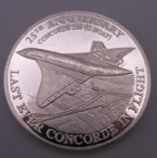 A pure silver Celebration of Concord last flight medallion. 6.5 cm diameter. 156.3 grammes.