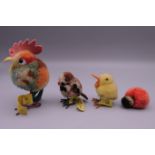 Three vintage Steiff chicks and a chicken. The largest 7.5 cm high.