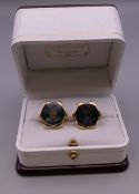 A pair of new Rolex cufflinks in Penrose of London box. 2 cm diameter.