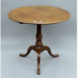 A 19th century mahogany tilt top tripod table. 79 cm diameter.