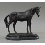 A bronze model of a horse. 22.5 cm high.
